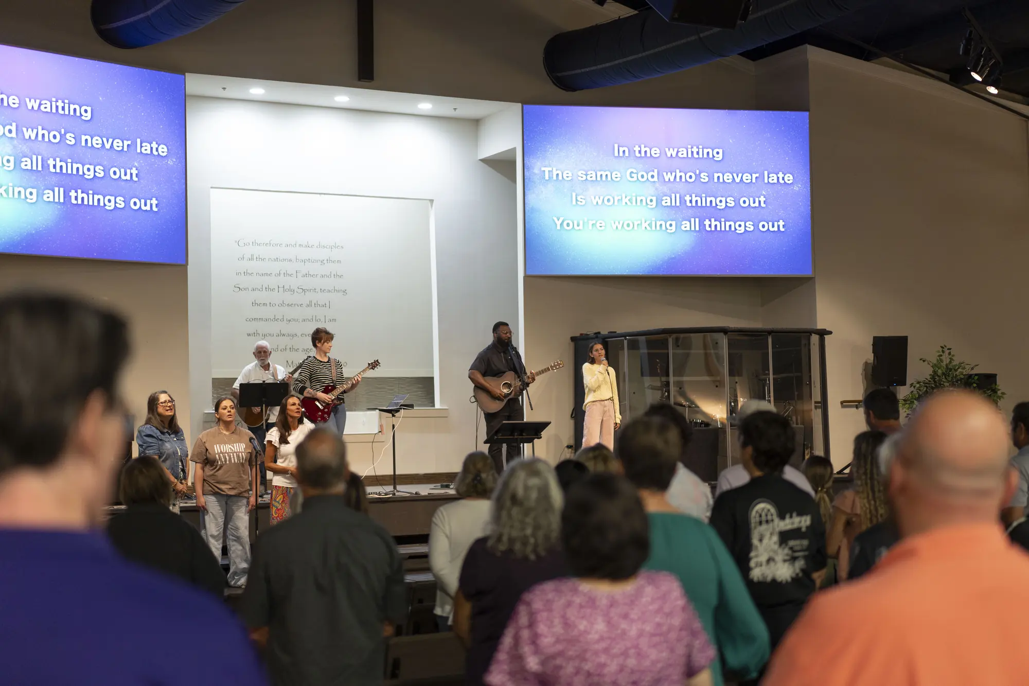 The congregation standing in worship on a Sunday morning at Church at Addis
