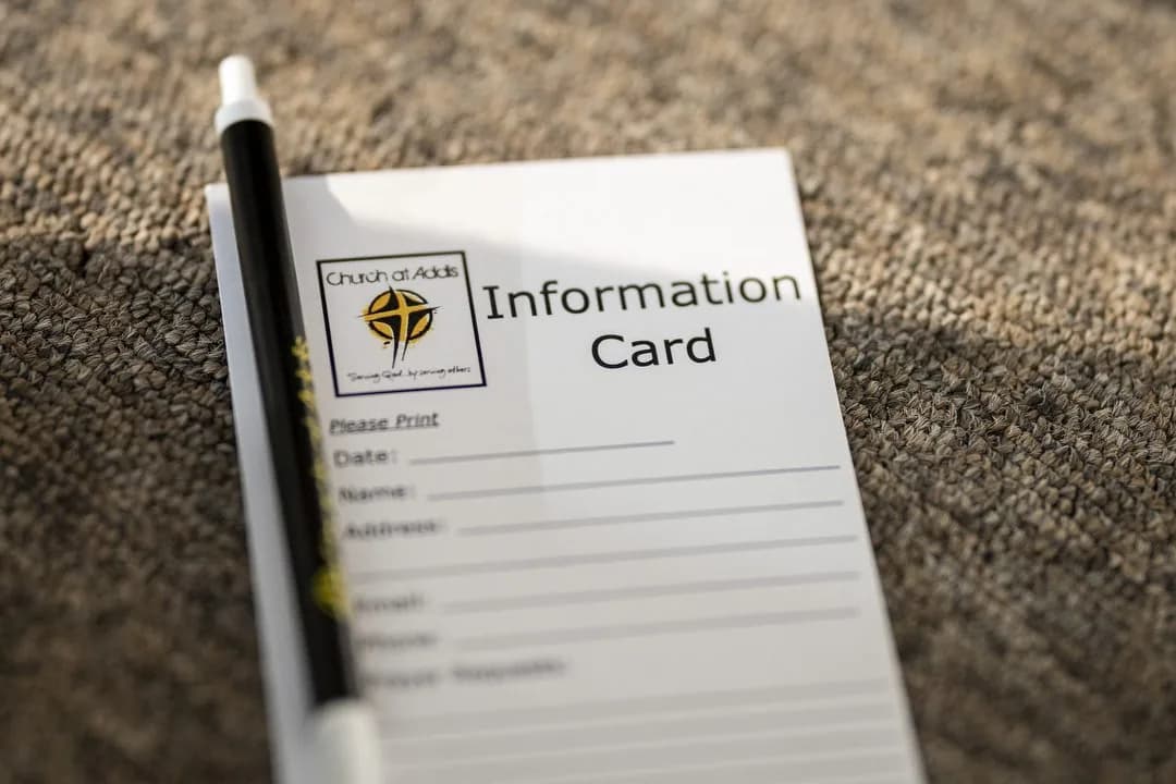 A Church at Addis information card and pen